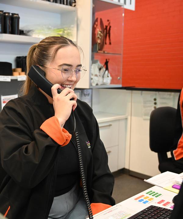 Staff member answering a phone